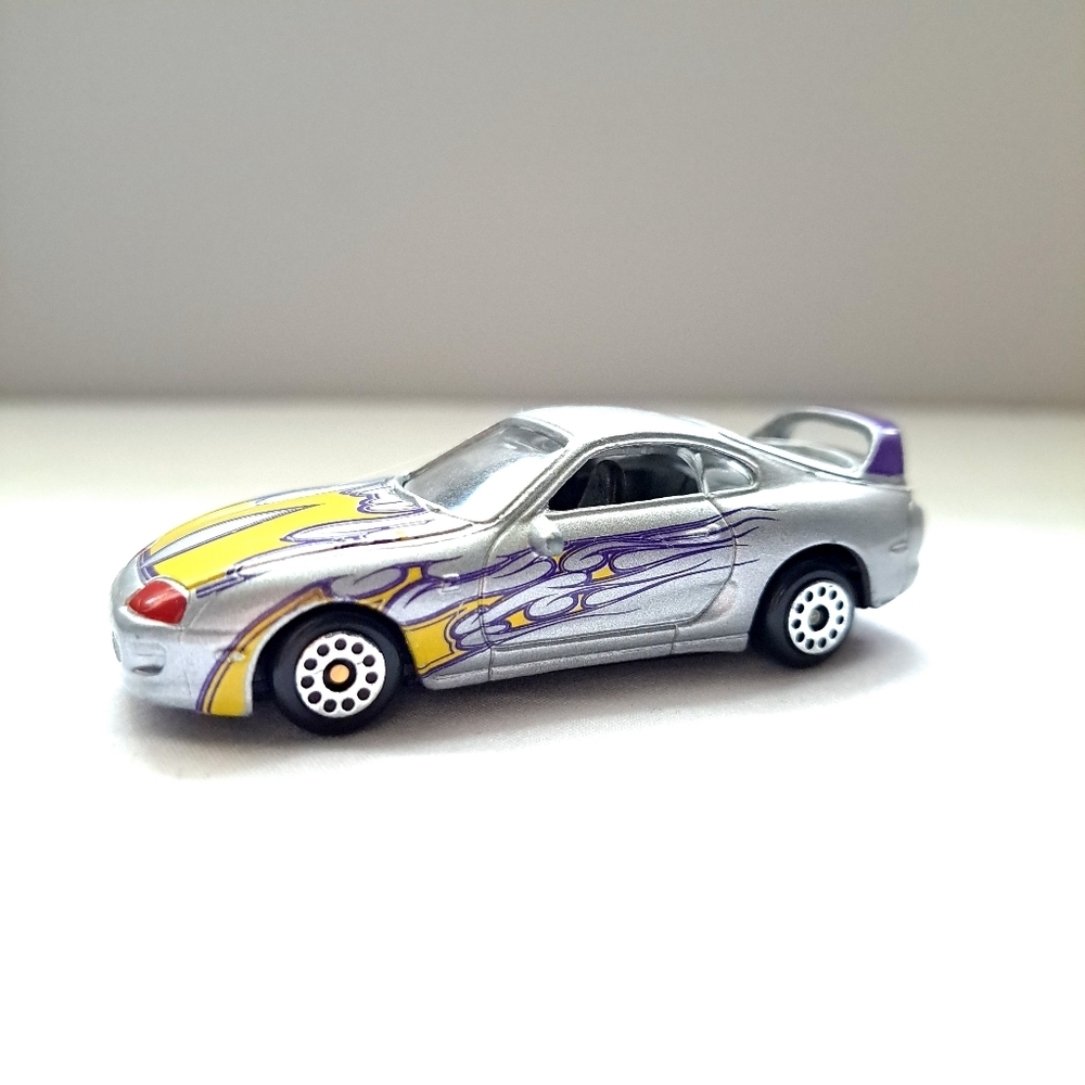 MotorMax (6012) Toyota Supra Diecast Silver w/ Yellow & Purple Flames